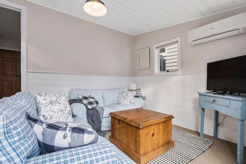 Irresistible, renovated 1840 inner-city cottage lounge 1