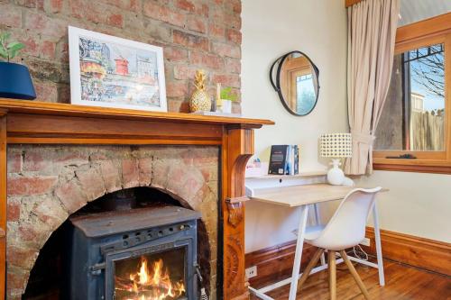 Renovated, character, family friendly cottage fireplace